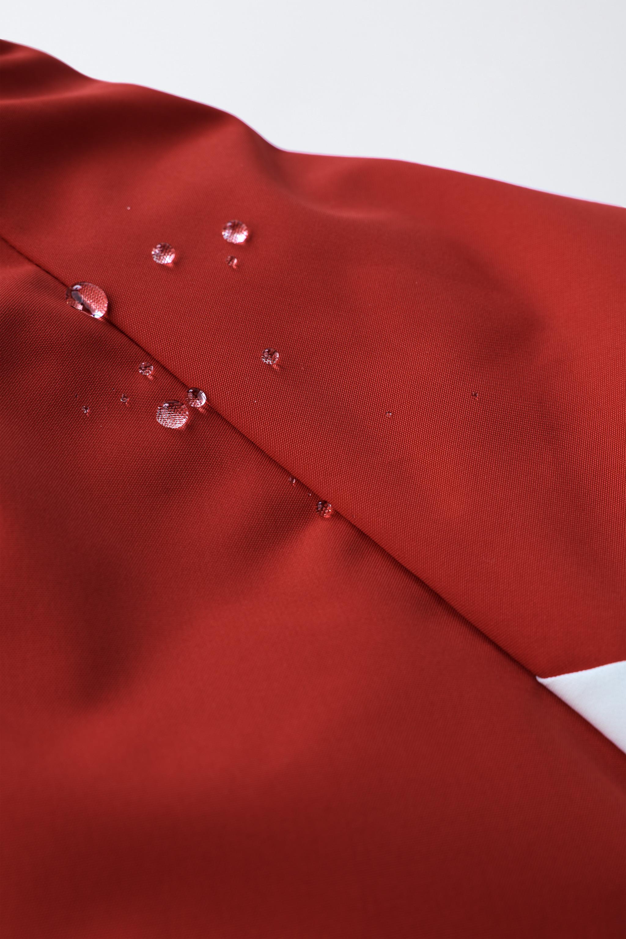 WATER RESISTANT AND WINDPROOF COLOR BLOCK LONG JUMPSUIT